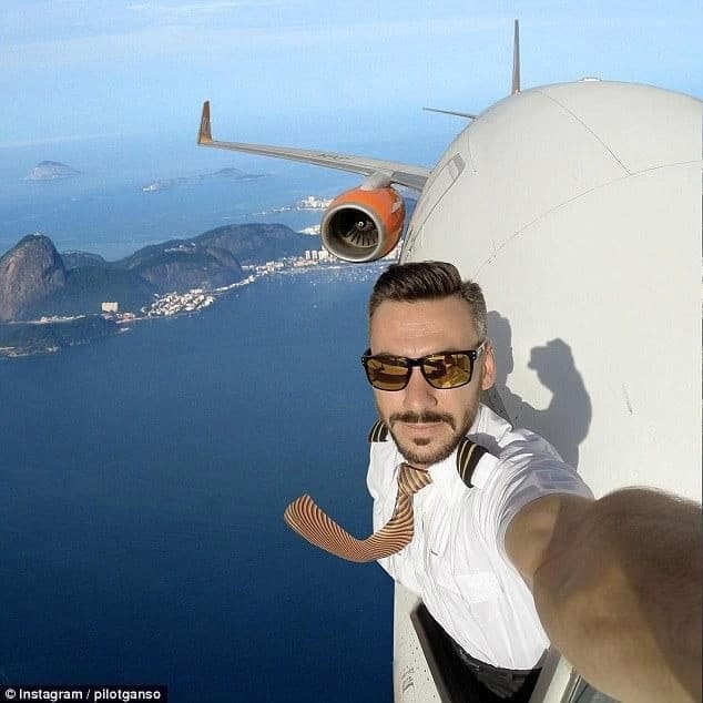 Person standing on aircraft wing